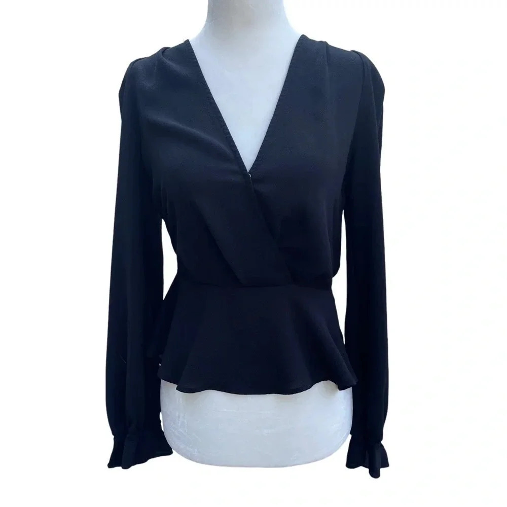 Lulus v-neck peplum black blouse top. Elastic sleeve cuffs, button at bust.